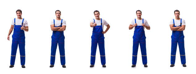 Handsome repairman wearing blue coveralls on white