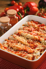 Enchiladas - mexican food, tortilla with chicken, cheese and tomatoes.