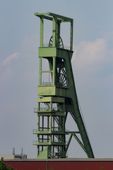 Coal mining tower in front of sky