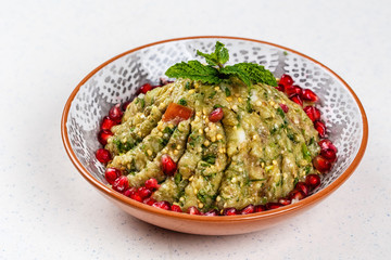 Raheb Salad served with pomegranate.