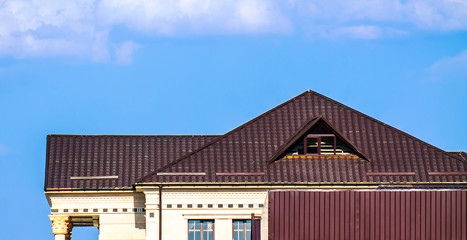 Roof of the house from the metal profile