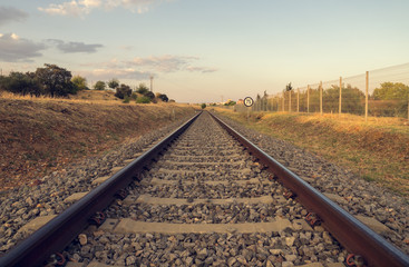 Railroad tracks and reduction signal to 75 kilometers per hour