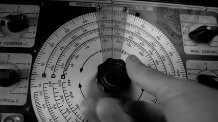ADJUSTING VINTAGE RADIO EQUIPMENT, CLOSE UP