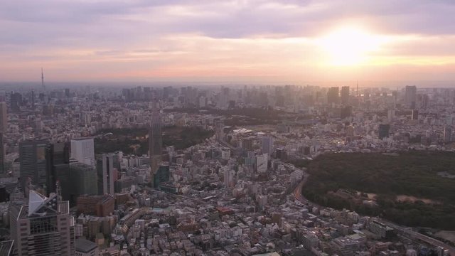 Japan Tokyo Aerial v32 Flying across downtown Shinjuku with cityscape views sunrise 2/17