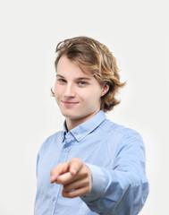 Attractive teenage boy,gray background