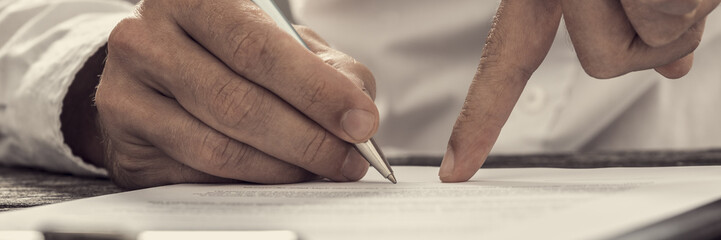 Showing new business partner where to sign an agreement