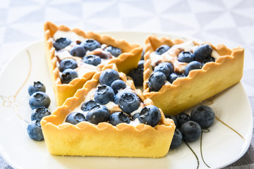 cakes with cream and berries