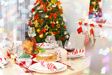 Table served for Christmas dinner in living room