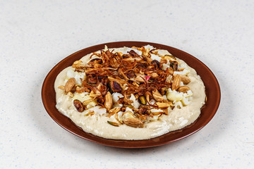 Hummus with olive oil and nuts