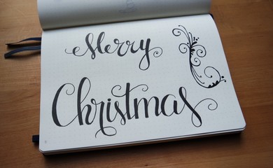 Carnet / agenda personnalisé. Lettrage et calligraphie de Noël. Merry christmas.