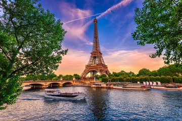 Wall murals Eiffel tower Paris Eiffel Tower and river Seine at sunset in Paris, France. Eiffel Tower is one of the most iconic landmarks of Paris.