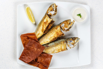 Tasty fish with vegetables and lemon