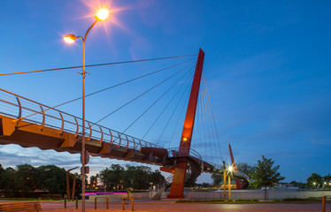 Fototapeta na wymiar Jelgava, Bridge. New pedestrian cable-stayed bridge in Jelgava.