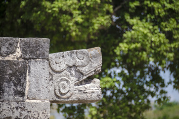 Serpent head of the Tzompantli at Chichen Itza, Mexico