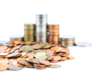 Coin stacks on a white background