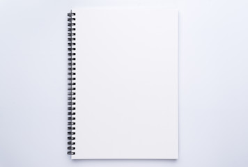 blank white spiral notebook  on white background