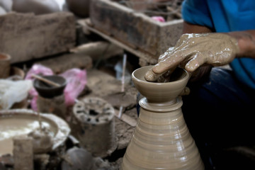 Handmade pottery made from clay, used in Thailand.