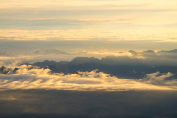 Heaven mountain in morning sun ray and winter fog.