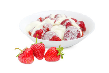 Fresh strawberries and strawberry dessert with whipped cream