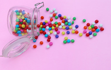 Colorful candies in a jar