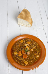 Stew of lentils with chorizo and pork