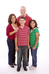 Hispanic family smiling isolated on white.