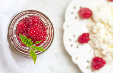 Homemade pancakes with honey, raspberries, cottage cheese with powder sugar. Flat lay, top view. copy space. eco style