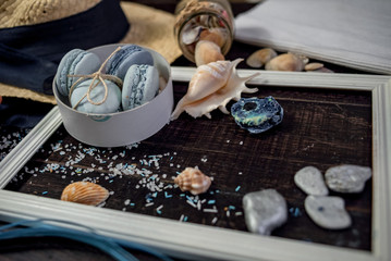Sea style decoration of macaroons in concept of dreaming about sea travel