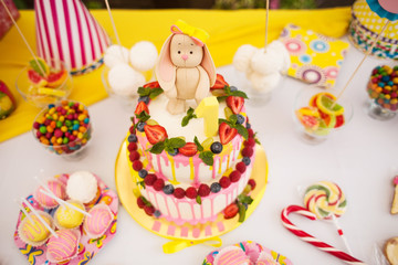 The two-storey cake for children's birthday with a hare