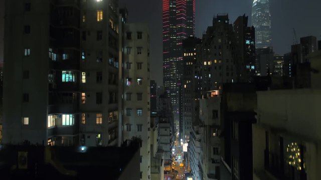 Hong Kong Aerial v68 Flying low rising up vertically with cityscape views at night