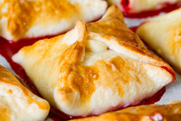 Homemade baking with fresh strawberry filling. Selective focus