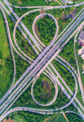 Aerial view, Road roundabout, Expressway with car lots in the city in Thailand.  beautiful Street , downtown, cityscape, Top view. Background