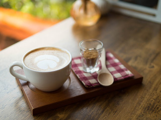 white cup of hot coffee