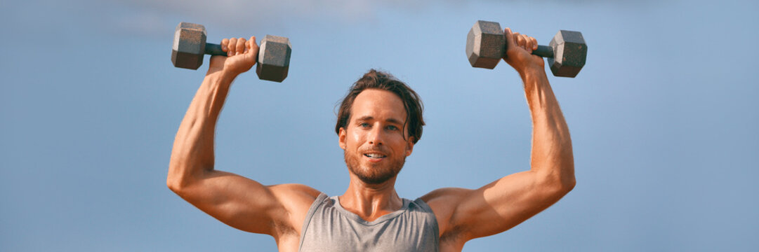 Fitness Gym Banner Man Lifting Dumbbell Weights. Panorama Horizontal Crop With Copy Space Of Athlete With Muscular Arms With Dumbbells Overhead Training Biceps.