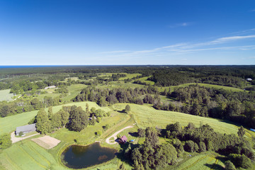 Summer day in latvian countryside, aerial view.