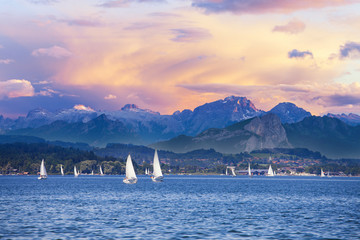 Yacht regatta on the alpine mountain lake
