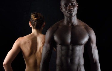 Fototapeta na wymiar Front and back mixed couple race on black