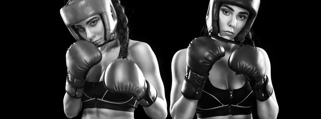 Fototapeta na wymiar Women boxer fighting. Isolated on black background. Sport concept.