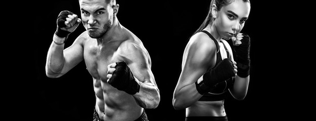 Fototapeta na wymiar Two sportsmans boxers on black background. Copy Space. Sport concept.