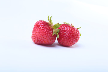 Fresh strawberry isolated on white background. Selective focus.