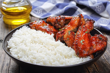rice with tasty glazed chicken wings