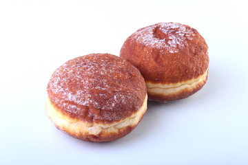 Homemade Doughnuts with Jelly filled and powdered sugar isolated on white background. Selective focus.
