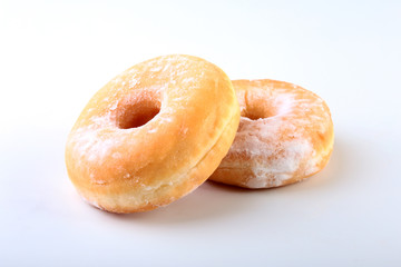 Homemade Doughnuts with Jelly filled and powdered sugar isolated on white background. Selective focus.