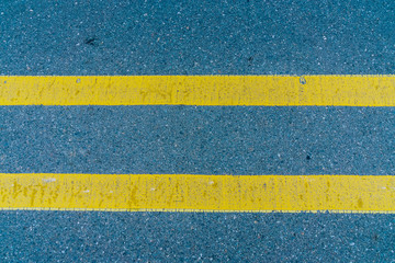 Double yellow line on the road texture