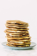Delicious pancakes on white background. Morning and breakfast concept