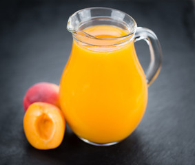 Portion of Apricot Juice on a slate slab