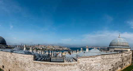 ISTANBUL, TURKEY - MAY 05, 2017:Panoramic View of galata tower from roof of  Buyuk Valide Han an old Ottoman inn that accommodated traveling merchants over 350 years ago