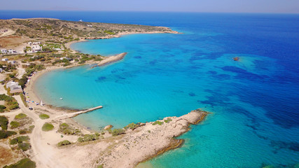 Fototapeta na wymiar Aerial drone photo of Koufonisi island with clear turquoise waters, Cyclades, Greece