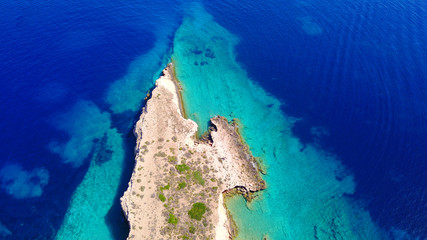 Aerial drone photo of Glaronisi island with clear turquoise waters, Cyclades, Greece