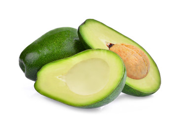 fresh whole and half avocado isolated on white background